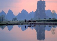 sunrise reflection at fish farm Yangshou