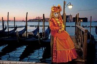 masked woman at dawn venice carnival