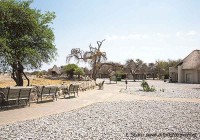 Okaukuejo waterhole and chalet