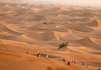 in the red sand dunes Dubai