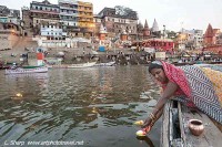 Offering a candle tribute river Ganges varanasi india